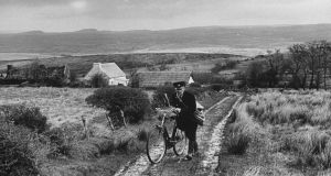 A post man by the Border. Photograph by Terence Spencer/The LIFE Images Collection/Getty Images
