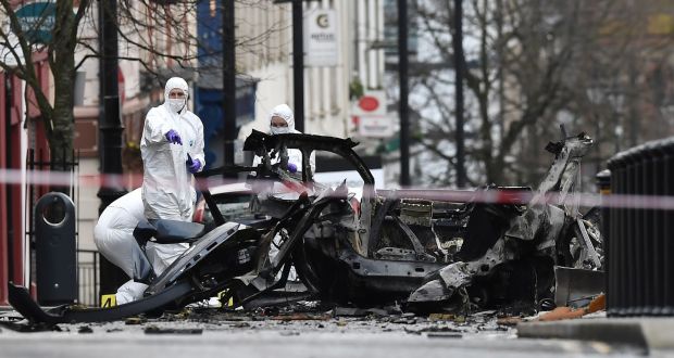Forensic officers inspect the remains of the vehicle  used as a car bomb outside Derry courthouse on January 20th, 2019. Photograph:  Charles McQuillan/Getty Images