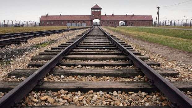 The railway tracks leading to the main gates at Auschwitz II – Birkenau: The more people who study this history the fewer excuses we will have as a society to fall into a similar trap. Photograph: Scott Barbour/Getty