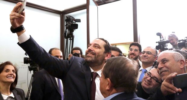 Lebanese prime minister Saad al-Hariri  takes a selfie with journalists at the Presidential Palace in east Beirut, Lebanon, on Thursday.  Photograph: Wael Hamzeh