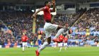 Marcus Rashford celebrates opening the scoring for Manchester United against Leicester City. Photograph: Ben Stansall/AFP/Getty