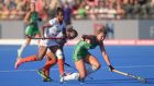 Ireland’s Nicola Evans is fouled by India’s Sunita Lakra during   last year’s Hockey World Cup quarter-final. Photograph: Inpho