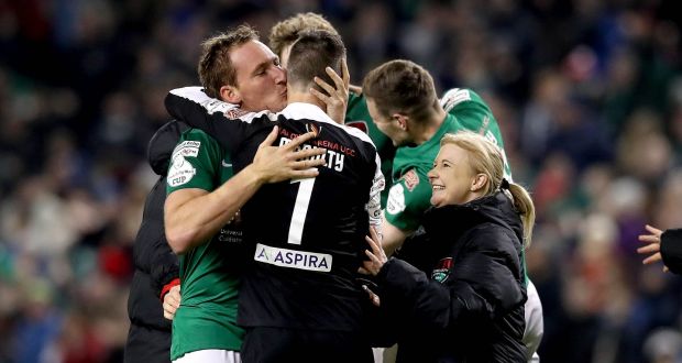 Lisa Fallon celebrates with Mark McNulty and Achille Campion after Cork City’s victory over Dundalk in the 2017 FAI Cup Final at the Aviva stadium. Photograph: Ryan Byrne/Inpho