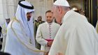 Pope Francis (R) shakes hands with Abu Dhabi’s Crown Prince Mohammed bin Zayed al-Nahyan  in the UAE capital. Photograph: Vatican media/AFP/Getty Images