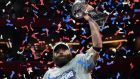 New England Patriots wide receiver Julian Edelman holds the trophy as he celebrates their Super Bowl win against the Los Angeles Rams at Mercedes-Benz Stadium in Atlanta, Georgia. Photograph:   Timothy A Clary/AFP/Getty Images
