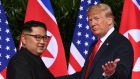 US president Donald Trump and North Korean leader Kim Jong-Un first met  in Singapore last June. Photograph: Saul Loeb/AFP/Getty Images
