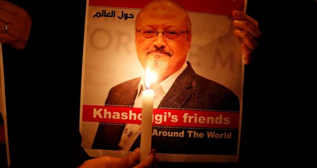A demonstrator holds a poster with a picture of Saudi journalist Jamal Khashoggi outside the Saudi consulate in Istanbul last October. Photograph: Osman Orsal/Reuters