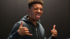 Dortmund’s Jadon Sancho wants to be a good role model for youngsters in London. Photograph: Getty Images