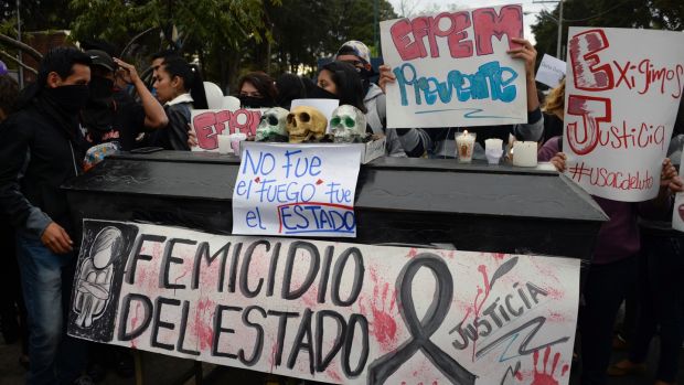 Guatemalan University students take part in a protest demanding justice for the girls killed in the state-run shelter fire in March 2017. Photograph: Johan Ordonez/AFP/Getty Images