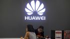 People in a Huawei shop in Bangkok, Thailand: Some network operators in Europe are warning  a Huawei ban could push back deployment of 5G by as much as three years. Photograph: Athit Perawongmetha