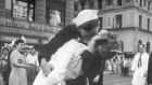 A sailor and a woman kissing in Times Square as people celebrate the end of second World War on August 14th, 1945, in New York. Photograph: Victor Jorgenson/US Navy via The New York Times