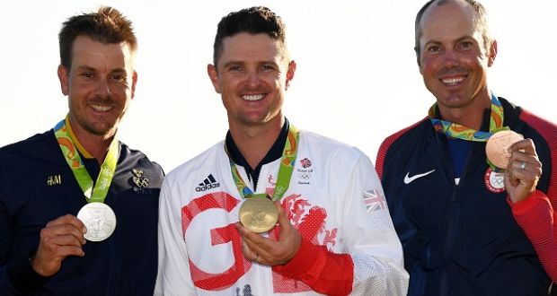 Justin Rose, Henrik Stenson and Matt Kuchar with their medals at the Olympic Games in Rio. Photograph: Ross Kinnaird/Getty Images