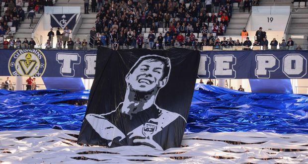 Bordeaux’s supporters display a banner depicting late Argentine footballer Emiliano Sala during the French Ligue 1 match against Toulouse. Photo: Nicolas Tucat/Getty Images