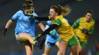 Dublin’s Kate Sullivan gets her shot away despite the attempted block from Donegal’s Niamh Carr during the teams’ recent  clash at Croke Park. Photograph: Tommy Greally/Inpho 