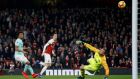 Mesut Özil opens the scoring for Arsenal in the Premier League game against Bournemouth at the Emirates stadium. Photograph: Ian Kington/AFP/Getty Images