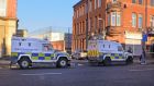 Police at the scene in Belfast after  Ian Ogle, was murdered in January. Photograph: Michael McHugh/PA Wire