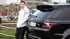 Jamie Heaslip with his Range Rover Sport PHEV (Plug-In Hybrid Electric Vehicle).