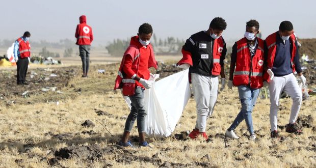 Members of the search and rescue team  at the scene of the Ethiopian Airlines  plane crash. Photograph: Tiksa Negeri/Reuters