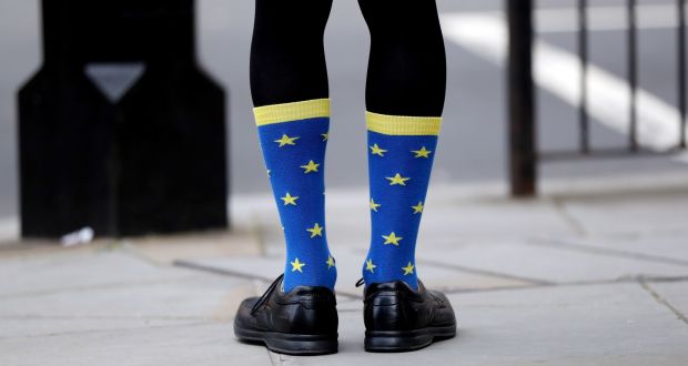 A Remain supporter sports European-flag socks: Ireland has saved Britain from the disaster of a hard Brexit and perhaps even from Brexit itself. Photograph: Jonathan Brady/PA