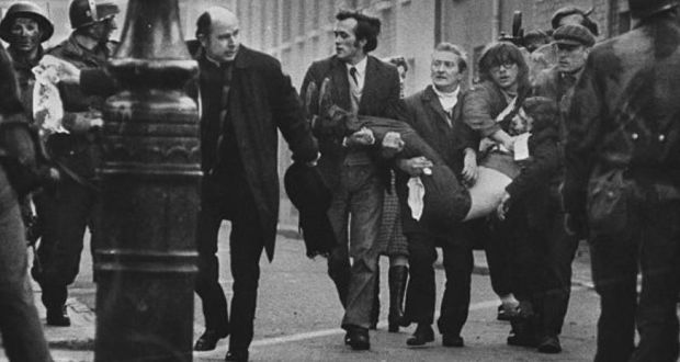 Fr Edward Daly and others run with an injured man on Bloody Sunday in Derry on January 30th, 1972