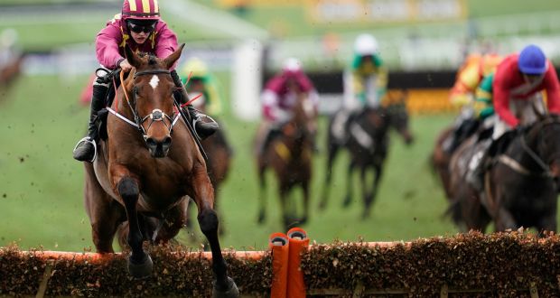  Rachael Blackmore, riding Minella Indo, clears the last hurdle to win The Albert Bartlett Novices’ Hurdle at Cheltenham. Photograph: Alan Crowhurst/Getty Images