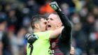 Sheffield United goalkeeper Dean Henderson  and defender  John Egan celebrate the win after the Championship match against Leeds at Elland Road. Photograph:  Richard Sellers/PA Wire