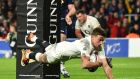 England’s George Ford dives over the line to score England’s final try.  The game finished 38-38. Photo:   Glyn Kirk/Getty Images