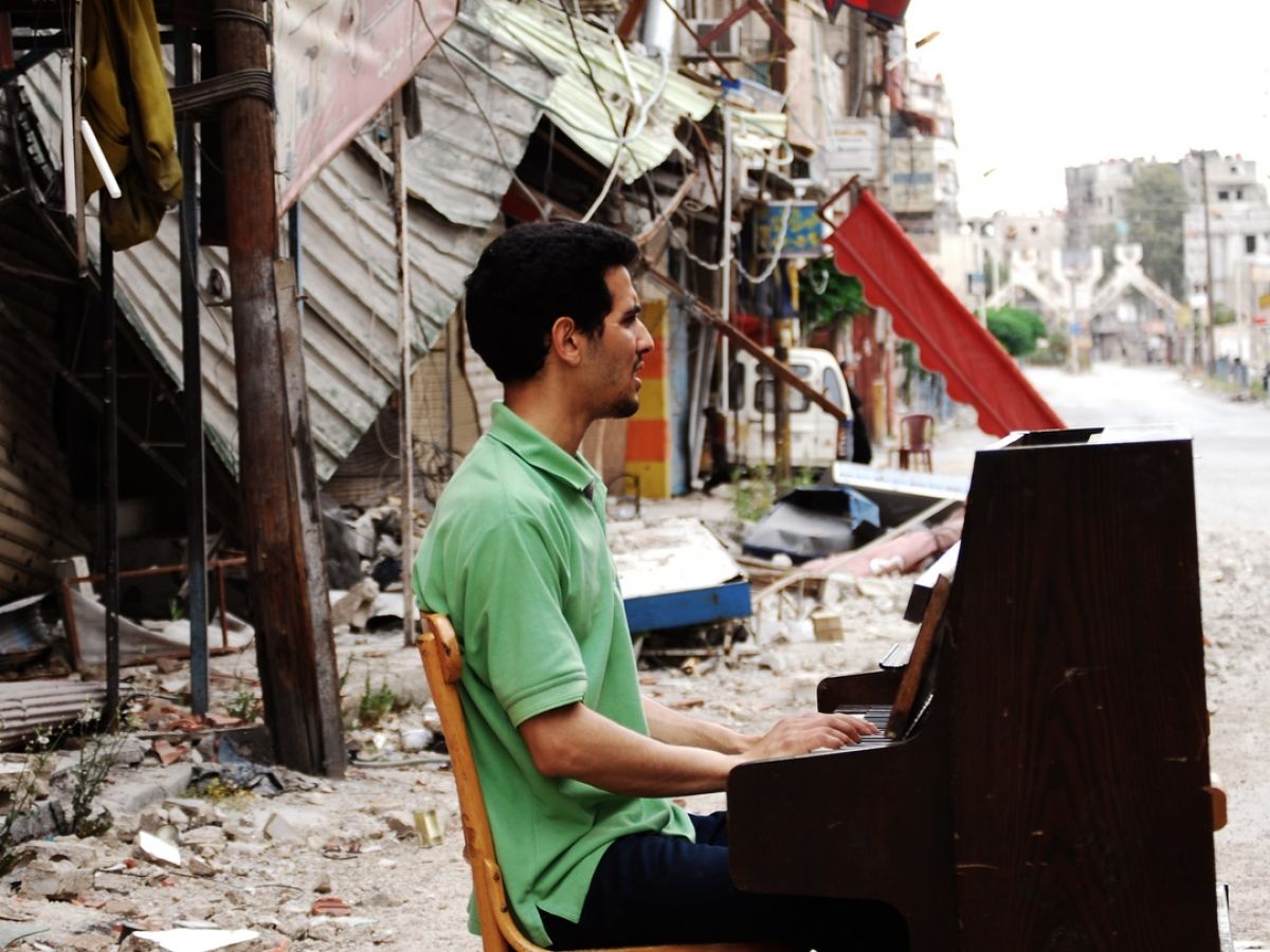 Pianist In The Rubble A Palestinian Syrian Refugee S Journey Through Music - ussr national anthem roblox id loud syrian civil war