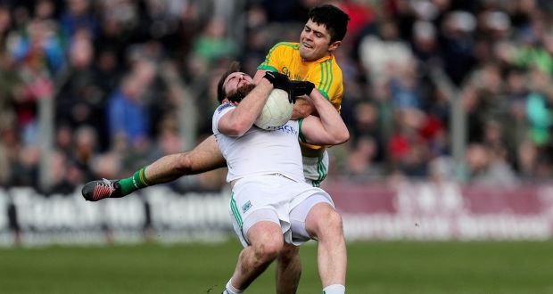 Fermanagh’s Seán Quigley is tackled by Ben Brennan of Meath during the Allianz Football League Division 2 match at Páirc Tailteann. Photograph: Laszlo Geczo/Inpho
