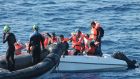 Crew from the Irish Navy ship LE Eithne rescuing 12 people from a small boat in  the Mediterranean in 2015. File Photograph: Irish Defence Forces/PA Wire