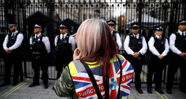A pro-Brexit yellow vest protester demonstrating outside Downing Street in London. Photograph: Alkis Konstantinidis/Reuters