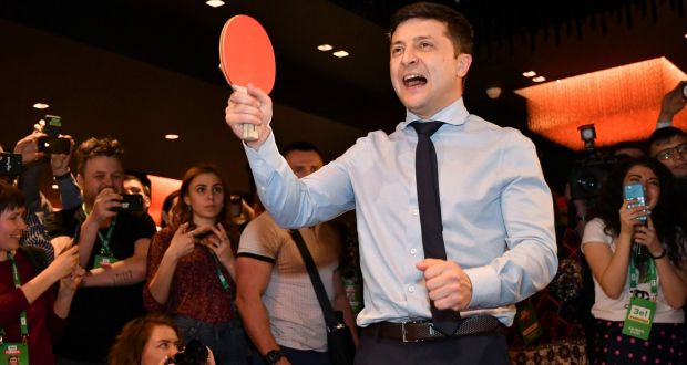 Ukrainian comic actor and presidential candidate Volodymyr Zelenskiy plays table tennis with a journalist ahead of the provisional results of the first-round vote in the election, in Kiev. Photograph: Genya Savilov/AFP/Getty Images