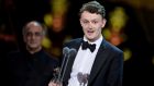 Chris Walley accepts the Best Actor In A Supporting Role award for The Lieutenant Of Inishmore on stage during The Olivier Awards in London, England. Photograph: Jeff Spicer/Getty Images.
