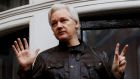WikiLeaks founder Julian Assange is seen on the balcony of the Ecuadorian Embassy in London, 2017. Photograph: Peter Nicholls/Reuters 