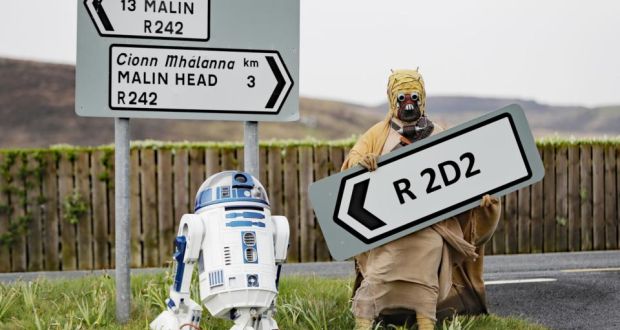 A Tusken Raider character poses with an R2D2 droid replica at the opening of the R2D2 road in Malin Head, Co Donegal on Monday. Photograph: Niall Carson/PA Wire