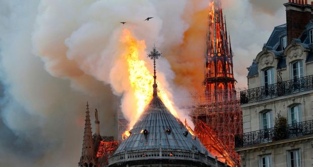 Smoke and flames rise from the Notre Dame cathedral in central Paris. Photograph:  Francois Guillot/ AFP/Getty Images