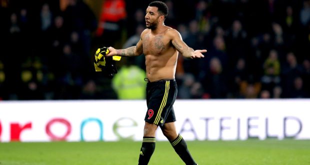 Watford’s Troy Deeney walks off the pitch after receiving a red card. Photograph: PA