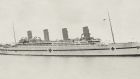The HMHS Britannic, sister ship of the Titanic, as a hospital ship, shortly before she sank in 1916