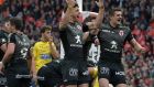 Toulouse players celebrate their dramatic  Top 14 victory over Clermont  at the Municipal Stadium last week. Sofiane Guitoune scored  a try in the 79th minute to seal a 47-44 win. Photograph: Pascal Pavani/AFP/Getty  
