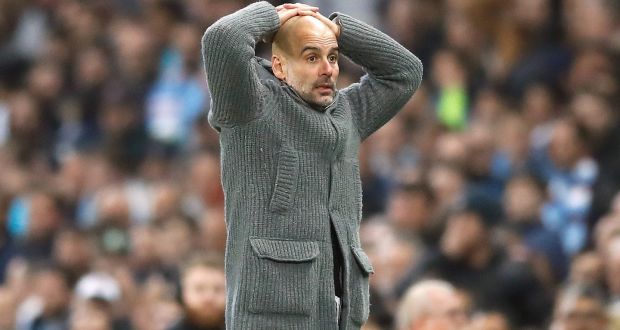 Manchester City manager Pep Guardiola reacts as he discovers  Raheem Sterling’s late goal against Tottenham, that would have sealed his side’s progress to the semi-final, was ruled out for offside.   Photograph: Martin Rickett/PA 