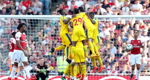 Crystal Palace’s James McArthur celebrates scoring his side’s third goal at the Emirates Stadium. Photograph: PA