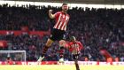 Shane Long of Southampton celebrates after scoring his team’s first goal during the Premier League win over Bournemouth at St Mary’s Stadium. Photo: Stu Forster/Getty Images