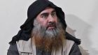 An undated screengrab taken from video released by Islamic State-linked Al-Furqan media shows the chief of  Islamic State,   Abu Bakr al-Baghdadi,  for the first time in five years  in an undisclosed location. Screengrab: AFP/Getty