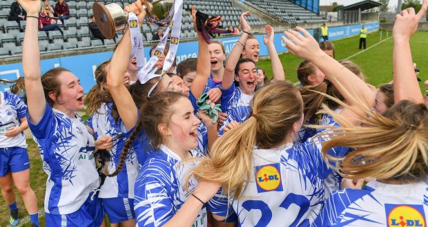  Waterford players celebrate with the Division Two cup at Parnell Park in Dublin. Photograph: Sportsfile