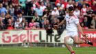 Tyrone’s Darren McCurry scores a goalagainst Derry. Photograph: Lorcan Doherty/Inpho