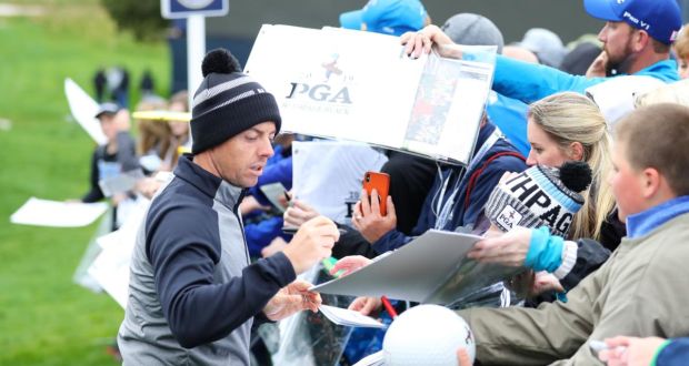 Rory McIlroy  signs autographs during a practice round prior to the 2019 PGA Championship at the Bethpage Black course in Long Island, New York, on Monday. Photograph: Warren Little/Getty Images
