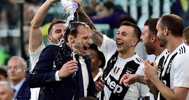 Juventus coach Massimiliano Allegri celebrates winning the league title in April. Photograph:  Massimo Pinca/Reuters