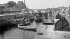 Barges and boats at the weir on the Shannon at Athlone, circa 1895. Photograph: National Library of Ireland/Flickr commons