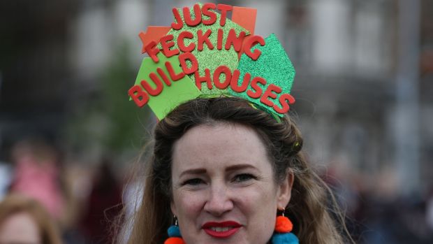 One woman at the rally indicates what she feels needs to be done to solve the housing crisis. Photograph Nick Bradshaw/The Irish Times