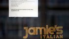It’s Oliver now: A sign on the window of a London outlet informs passersby that Jamie’s Italian has gone into administration. Photograph: Hannah McKay/Reuters
